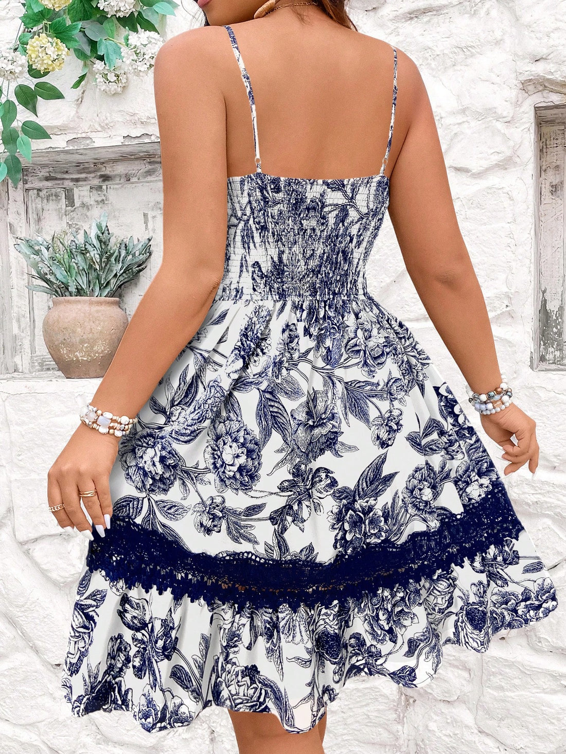 Elevate your special occasion style with this stunning lace splice cami dress! Designed specifically for curvy figures, this elegant number hugs in all the right places while the playful lace details add just the right amount of flirty charm. Whether you're dancing the night away at a New Year's celebration or swaying to your favorite tunes at a concert, this dress is your ticket to turning heads and collecting compliments. Who said looking fabulous had to be complicated?