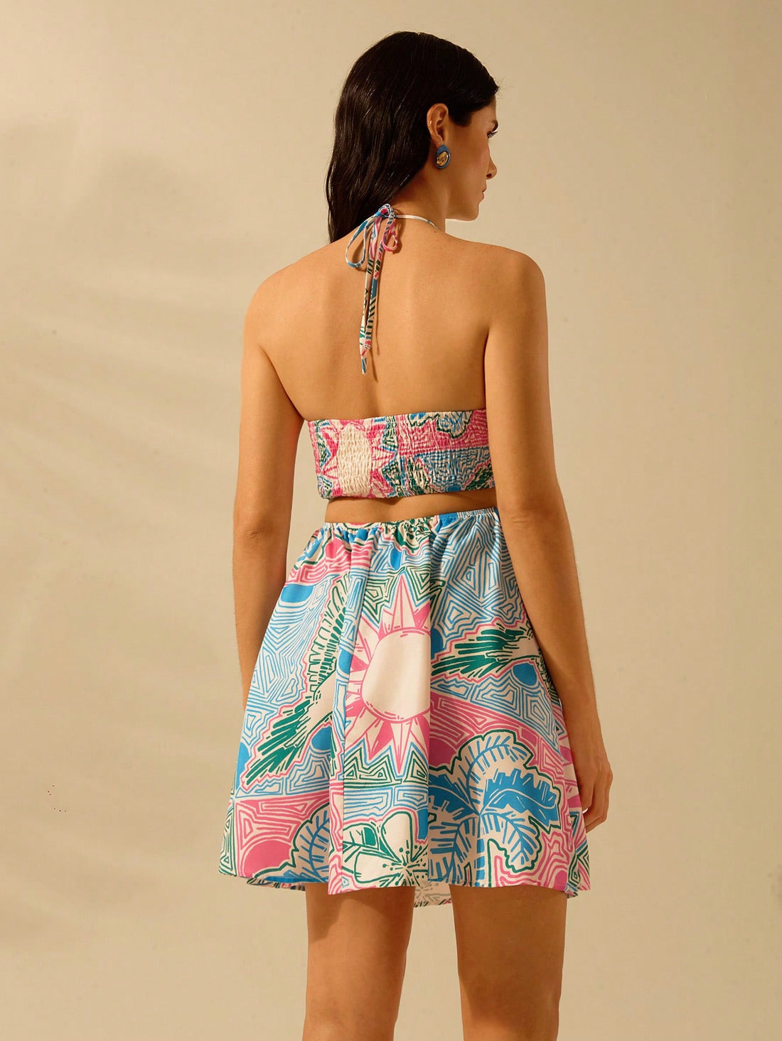 Live your best island life in our Bohemian Paradise dress! Featuring a tropical floral pattern, halter cut, and casual beach style, this dress is perfect for lounging by the ocean or dancing the night away. Embrace your inner bohemian and feel paradise in this must-have dress.