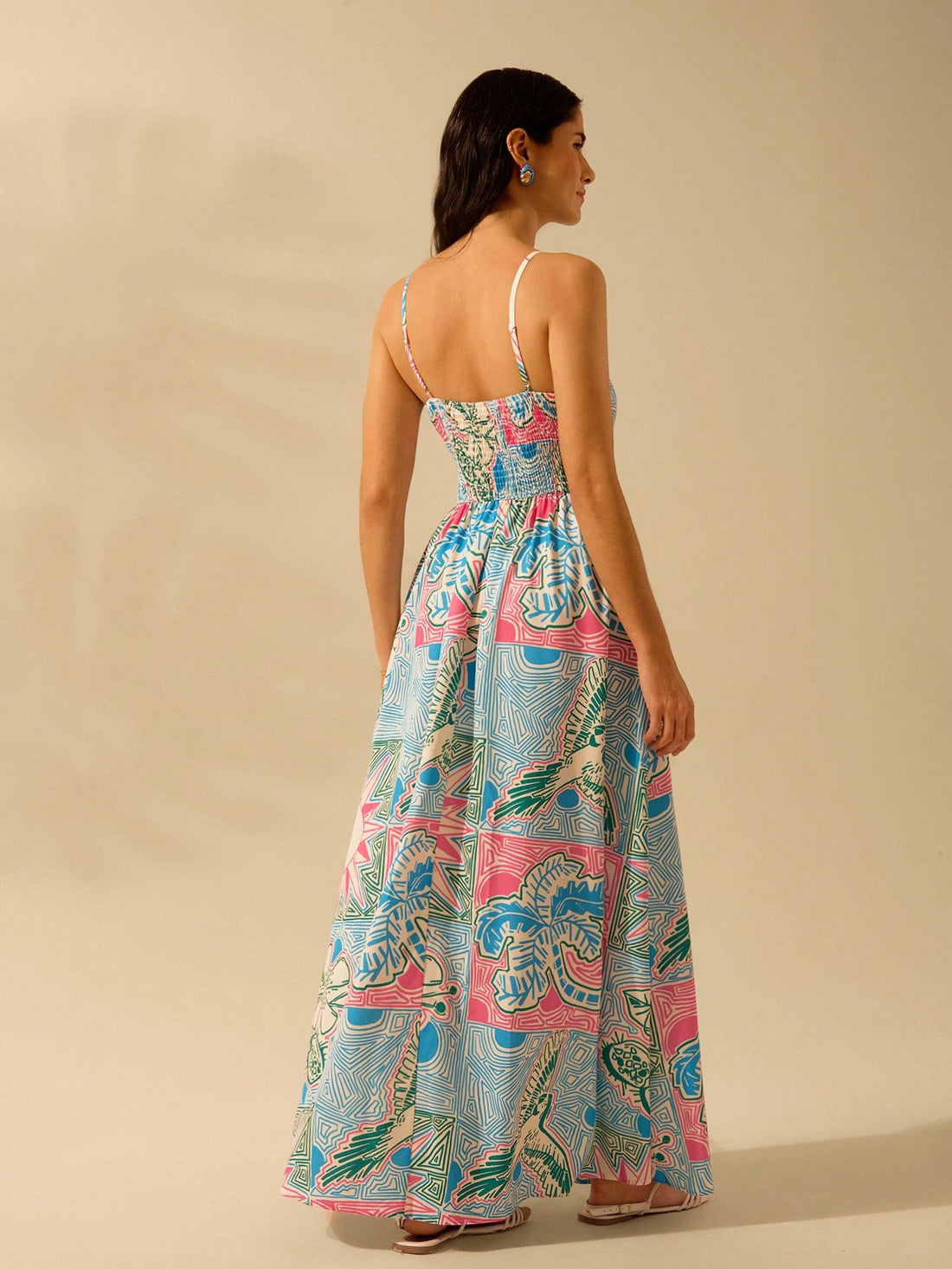 Get ready for the ultimate summer beach look with our Chic Boho Tropical Print Halter Dress! With its bold and vibrant design, this dress is perfect for all your beach getaways. Its halter neckline and flowy fit will keep you cool and stylish all day long. Don't miss out on the perfect summer dress!