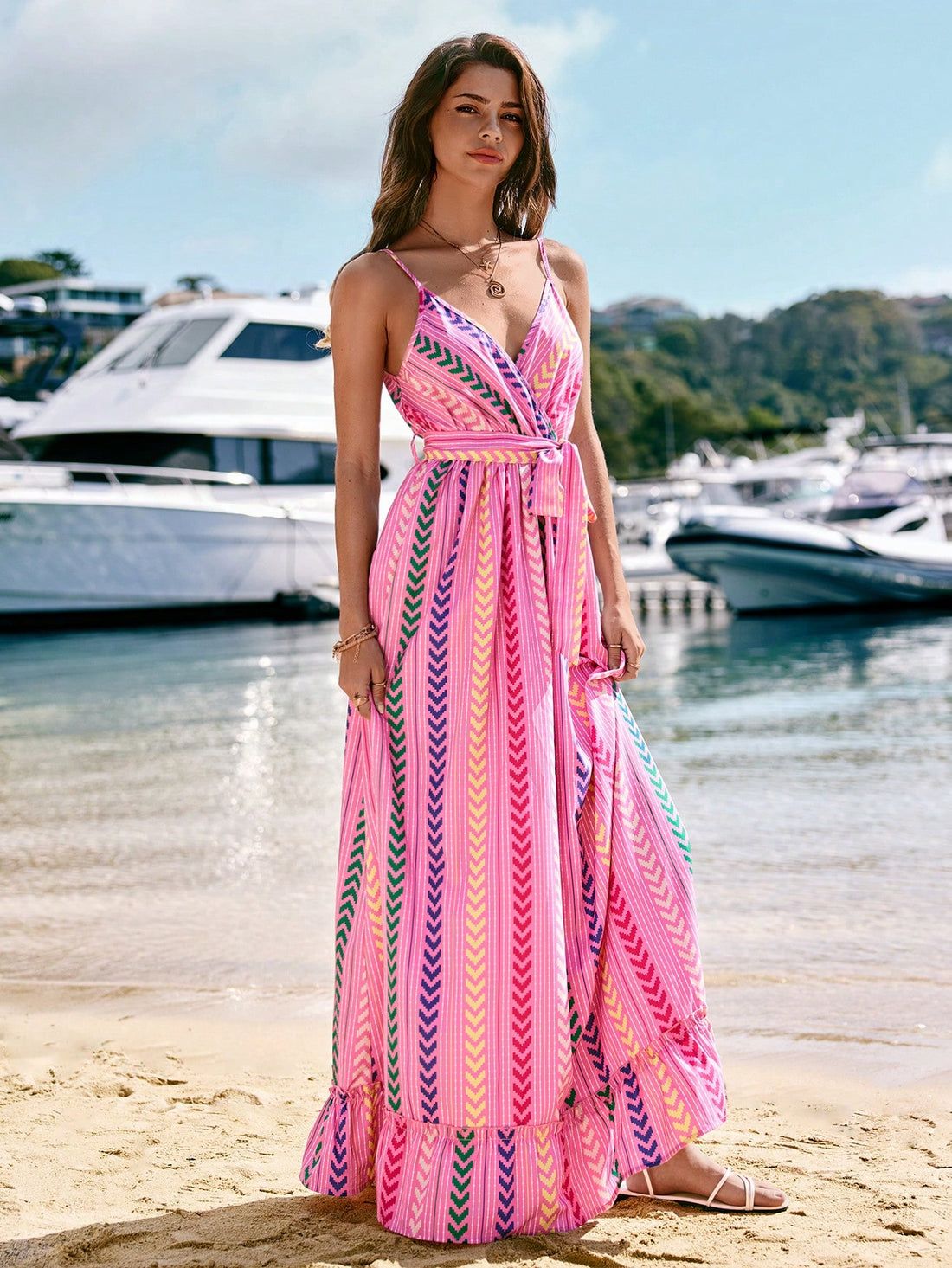 This maxi dress is a must-have for your summer vacation wardrobe. The chic geometric print adds a touch of style while the self-tie waist allows for a flattering fit. Perfect for those beach days and sightseeing adventures. Get ready to turn heads and make a statement!