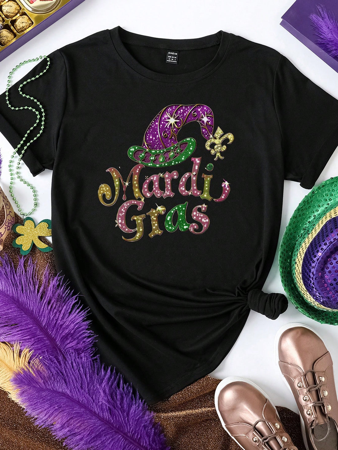 Unleash your playful side with the versatile Carnival Graphic Tee. This comfortable short sleeve crew neck is perfect for everyday style, adding a touch of fun and quirkiness to any outfit. Embrace the carnival vibes and stand out from the crowd with this must-have piece.