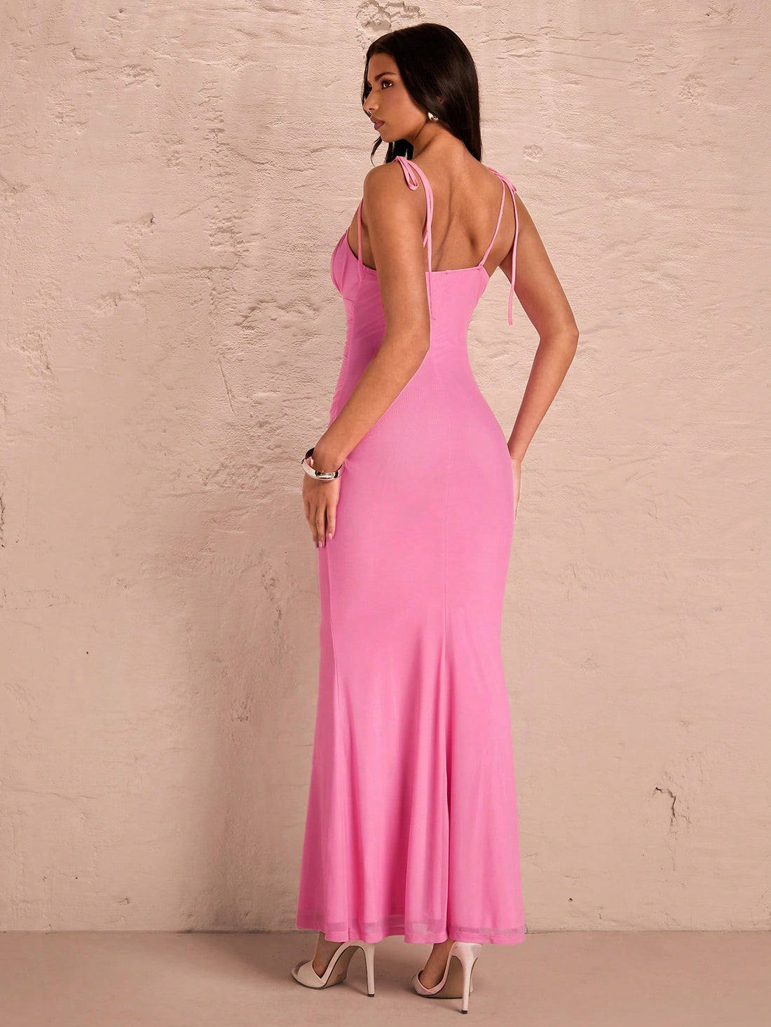 This playful pink mermaid hemline slip dress is the perfect choice for Valentine's Day or any romantic occasion. The spring-inspired color adds a touch of sweetness, while the mermaid hemline adds a flirty touch. The slip-style design is both comfortable and alluring. Be the belle of the ball in this spring pink dress!