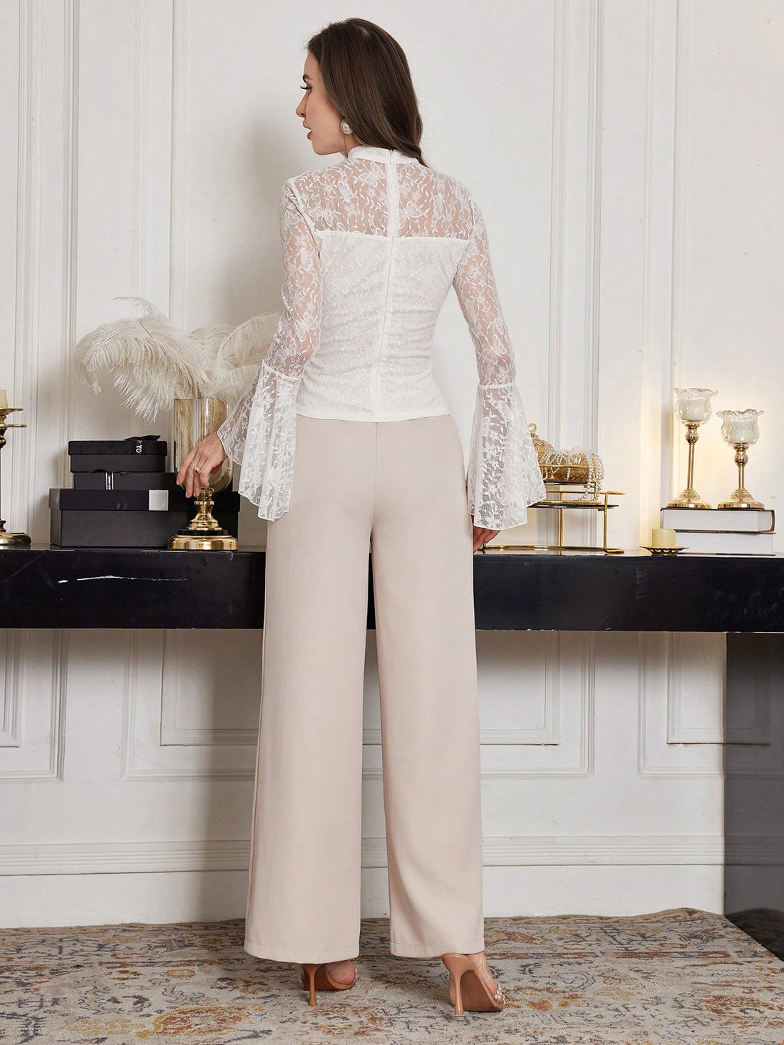 Embrace effortless elegance this season with our enchanting lace patchwork set. The romantic loose-fitting top features delicate lace detailing that catches the light beautifully, while the flowing wide-leg pants create a graceful silhouette that moves with you. Perfect for transitioning into fall, this two-piece ensemble combines vintage-inspired charm with modern comfort. Whether you're heading to brunch or a casual evening out, this set delivers that coveted "I woke up like this" sophistication without t