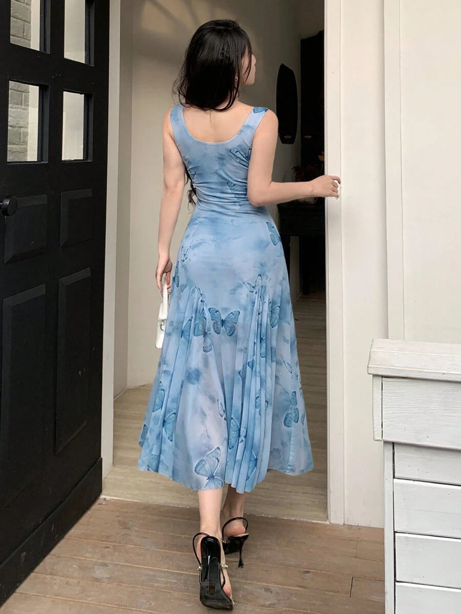 Step into sunny days with this Boho Chic Mid-Calf Floral Print Sleeveless Ruffle Dress. Its playful ruffles and breezy sleeveless design keep you cool and stylish, perfect for effortless summer adventures. The charming floral print adds a touch of whimsy, making every moment feel like a carefree celebration.