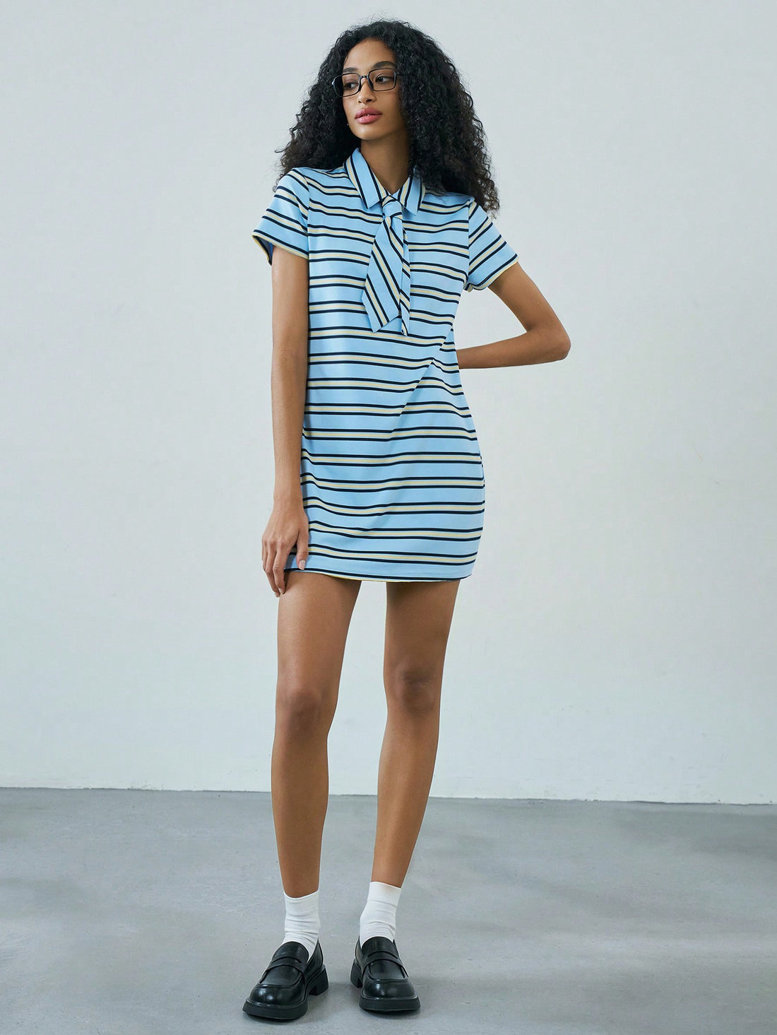 Add a splash of fun to your wardrobe with this Women's Striped Bowknot Casual Mini Dress. Featuring playful stripes and a charming bowknot detail, this short-sleeve dress is perfect for everyday adventures. Its breezy mini length keeps you cool and stylish, making it an easy choice for casual outings or spontaneous plans. Embrace effortless fashion with a touch of whimsy!
