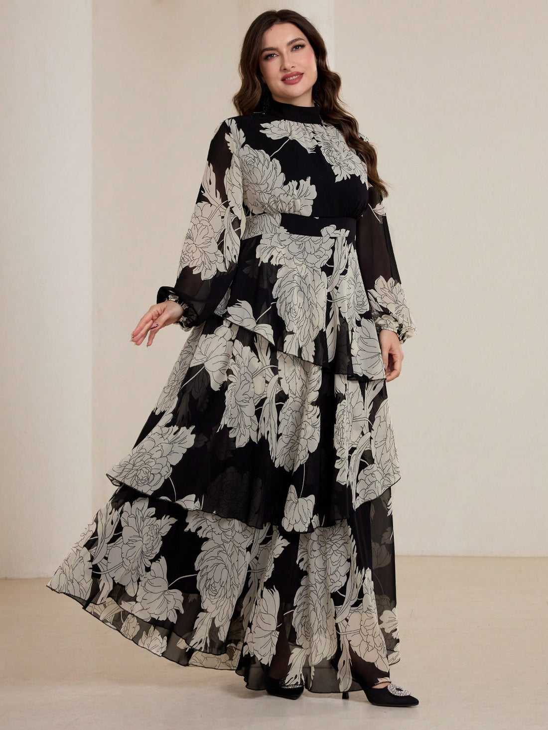 Elevate your fall wardrobe with this stunning floral chiffon dress that celebrates curves with effortless grace. The charming stand collar adds a touch of sophistication, while the cinched waist creates a flattering silhouette that hugs in all the right places. Crafted from lightweight, breathable chiffon, this plus-size beauty features a gorgeous floral print that transitions seamlessly from brunch to evening plans. Perfect for anyone ready to turn heads and feel absolutely fabulous this season!