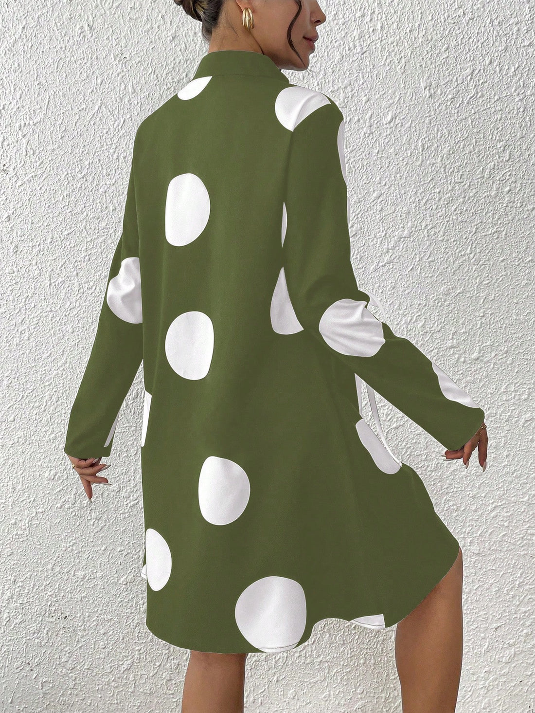 Introducing our Chic Elegance polka dot dress, designed for the fashion-forward women who loves to stand out! With its stand collar and tie closure, this dress exudes effortless elegance and offers a flattering fit. Perfect for any occasion, you'll feel chic and stylish in this one-of-a-kind dress.