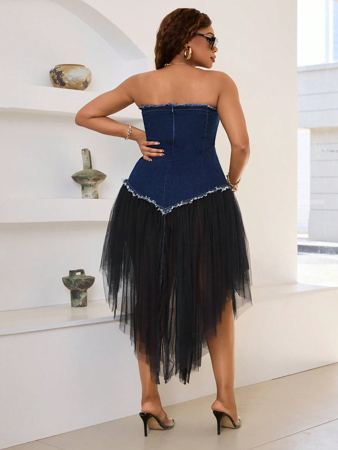 Elevate your summer style with our Trendy Plus Size Denim Dress! Perfect for beach vacations and music festivals, this dress features a fringe mesh hem for added flair. Stay on trend and comfortable all season long. Get ready to rock out in this must-have piece!