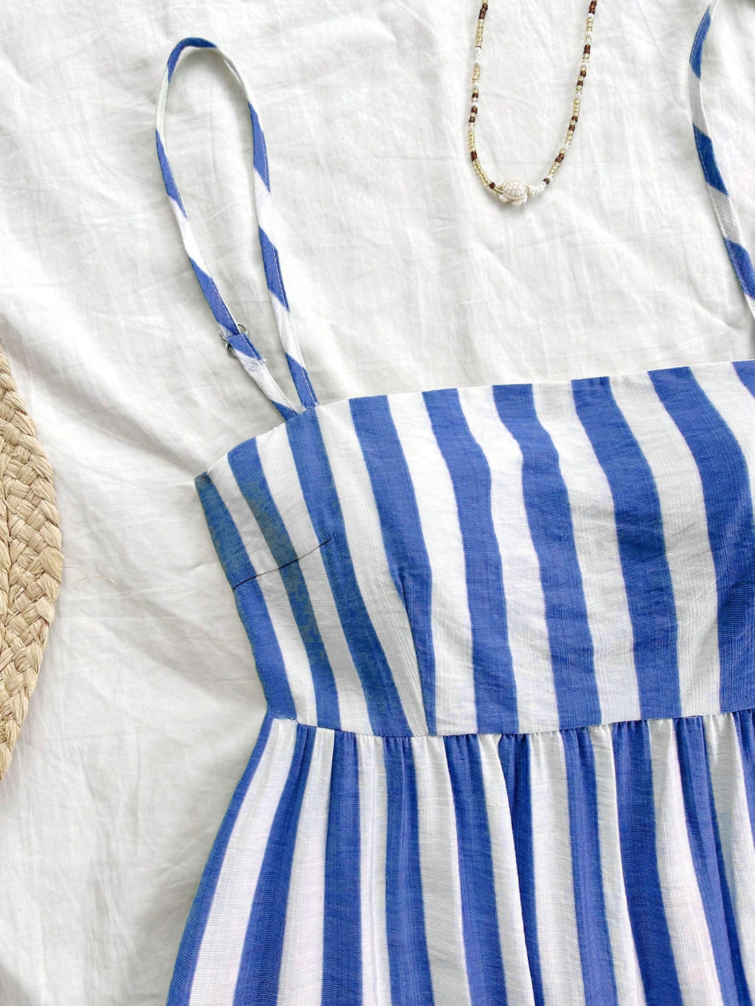 Effortlessly elevate your summer style with our women's striped A-line dress. Perfect for vacations and special occasions, this dress exudes effortless elegance. With its flattering A-line silhouette and chic striped design, you'll look and feel your best. Don't miss out - grab yours now!