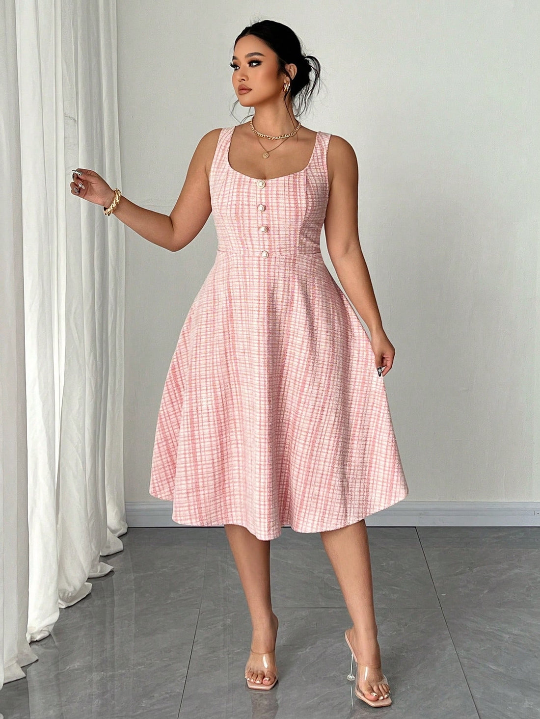 Get ready for Valentine's Day in style with this elegant plus size sleeveless dress! With delicate pearl button details, you'll feel romantic and sophisticated in this must-have dress. Perfect for a night out with your special someone, this dress is sure to turn heads and make you feel confident and beautiful.