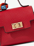 Close-up view of mini key ring holder keychain coin purse earphone pouch bag charm with chain strap, coin purse format, key ring detail for small-item storage