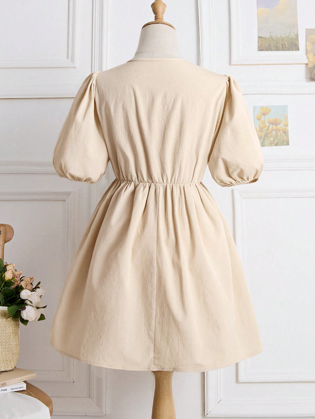 Add a little fun to your wardrobe with our Casual Puff Sleeve Mini Dress! Featuring a playful hollow-out bow tie detail and puff sleeves, this dress is perfect for spring and will have you looking effortlessly stylish. Say goodbye to boring outfits and hello to your new favorite dress!