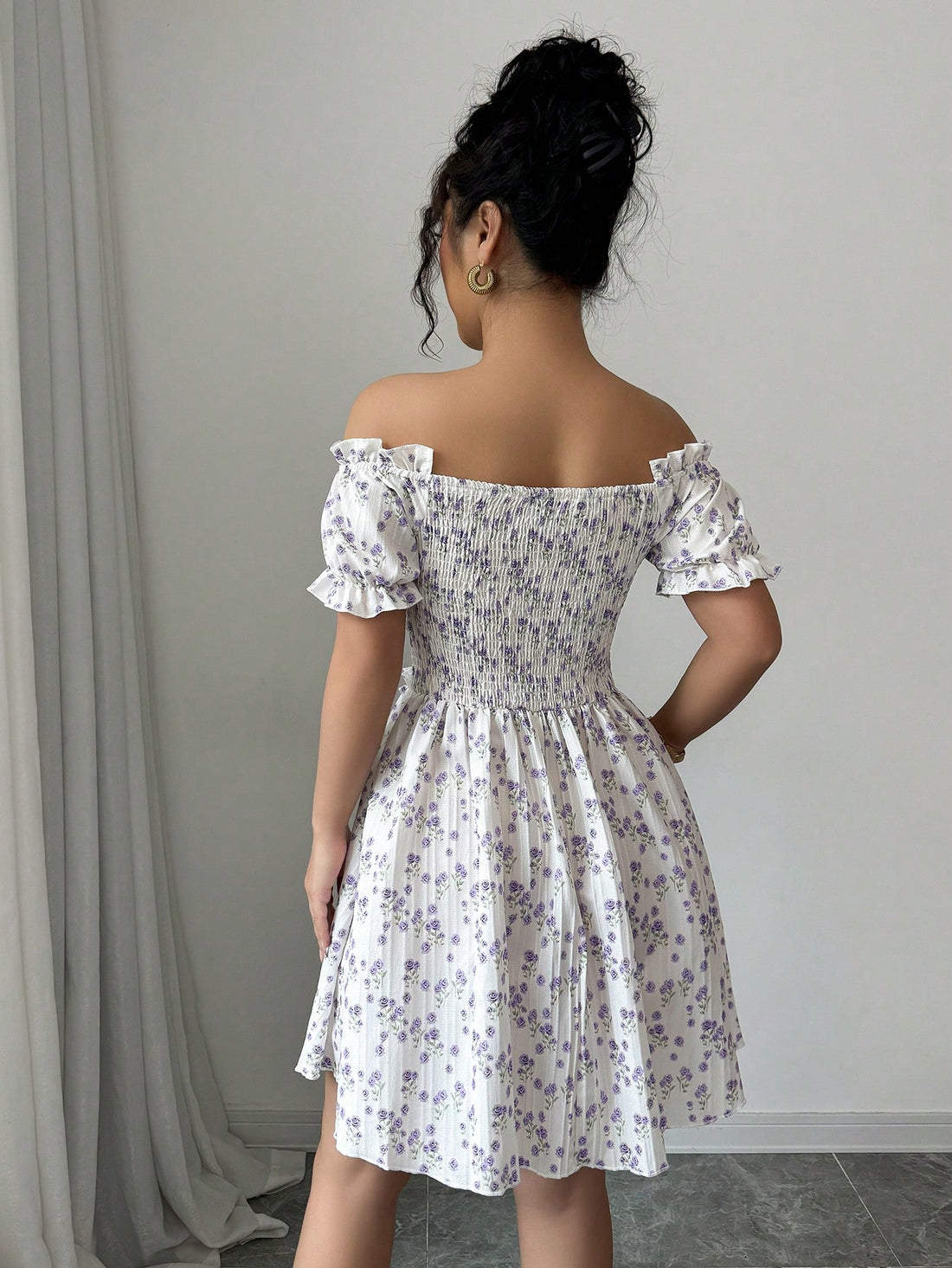 Upgrade your wardrobe with this charming off-shoulder floral mini dress! The playful puff sleeves add a touch of elegance while the off-shoulder design keeps it fun and flirty. Perfect for any occasion, this dress will surely turn heads wherever you go.