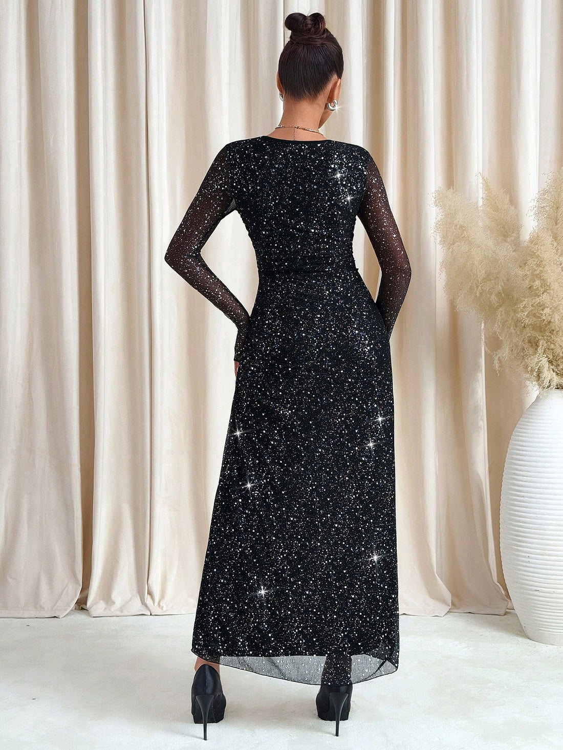 Turn heads this Valentine’s Day with our Women’s Long Sleeve Metallic Shimmer Dress. Its sparkling fabric catches the light beautifully, adding a touch of glamour to your evening. The long sleeves offer a chic, elegant silhouette while keeping you cozy. Perfect for celebrating love in style, this dress combines festive shimmer with timeless fashion flair.