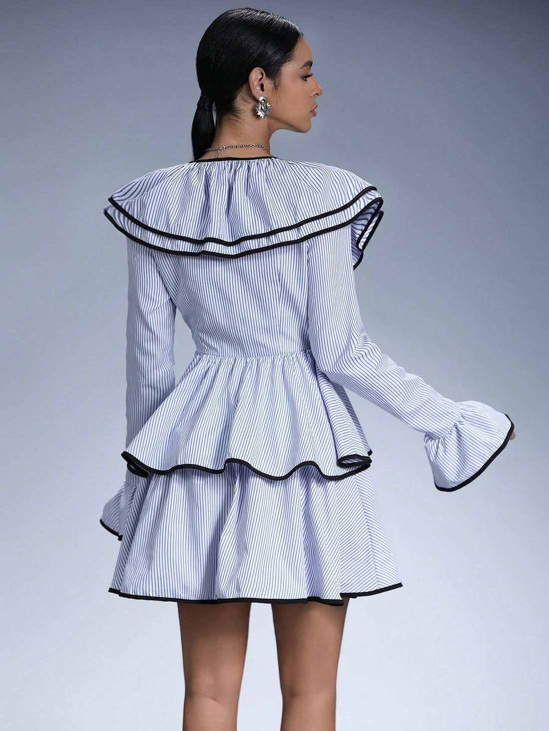 Get ready for some fun in the sun with this Playful Striped Ruffle Hem Dress! Featuring a charming Peter Pan collar and flirty ruffle hem, this dress is sure to turn heads. Perfect for a day out with friends or a picnic in the park.
