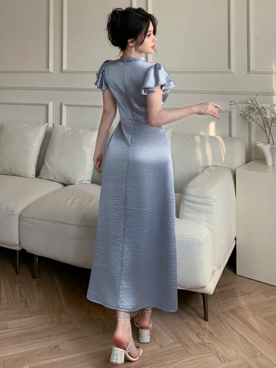 Get ready to shake up your spring/summer wardrobe with our Elegant Satin Blue Knot Dress! The unique ruffled flared sleeves add a touch of whimsy to the elegant satin fabric. Perfect for any occasion, this dress will have you feeling like a true fashionista. (And yes, it is as comfortable as it is stylish!)