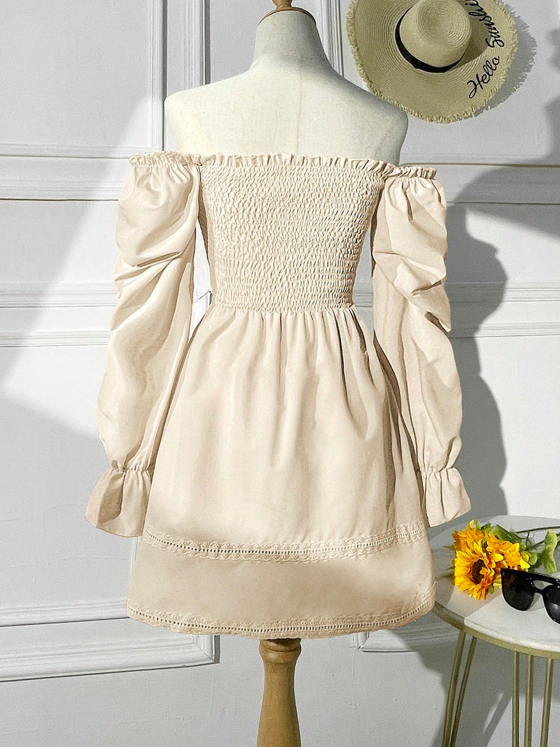 This mini dress is perfect for spring with its flutter trim and off-shoulder design. Stand out in a playful and flirty way with this dress that's sure to turn heads. Stay on-trend and feel confident all season long!