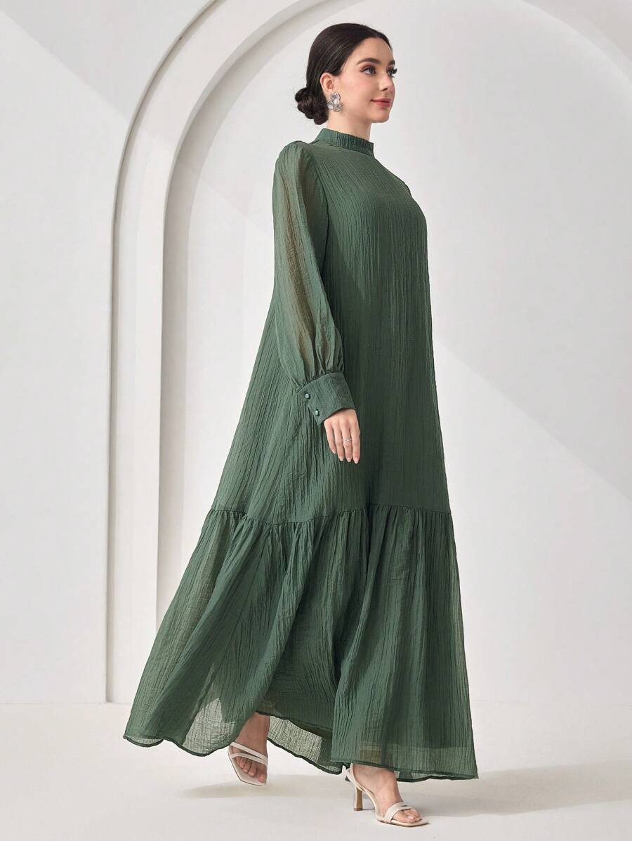 Elevate your everyday wardrobe with this stunning stand collar dress from Veilorie! Crafted in a rich, solid hue, this timeless piece effortlessly transitions from office to evening with its sleek silhouette and sophisticated neckline. The structured stand collar adds a modern edge while maintaining that classic elegance you'll reach for again and again. Perfect for anyone who believes great style doesn't need to shout—it whispers. Dress it up with heels or keep it casual with sneakers; this versatile essen