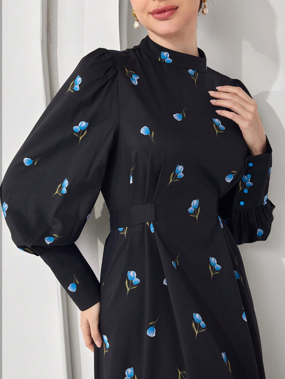 Effortlessly chic meets cultural flair in this stunning maxi dress that's basically a wearable work of art. The minimalist long sleeves keep things sophisticated while the all-over print adds personality and movement to every step. Perfect for those moments when you want to look polished without trying too hard—whether you're heading to a special event or just feeling fabulous on a regular Tuesday. This Arabic-inspired piece celebrates timeless elegance with a modern twist that'll have everyone asking where