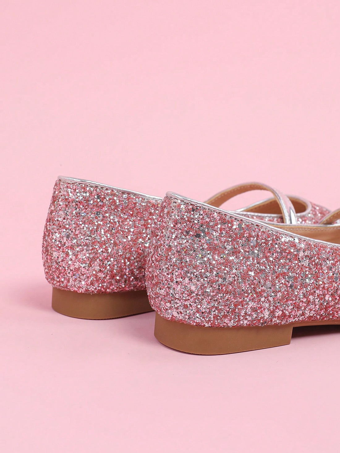 Upgrade your sweet style with these chic & sparkly ballet flats! Featuring faux pearl buttons and a trendy colorblock design, these flats will add the perfect touch of elegance to any outfit. Slip them on and step out in style with confidence.