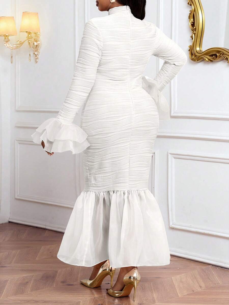 Slip into sophistication with this stunning plus-size lace dress featuring a dramatic fishtail hem that turns heads at every occasion. The intricate lace detailing adds timeless elegance, while the flattering silhouette celebrates your curves with confidence. Whether you're dancing at a wedding, mingling at a party, or enjoying a festival, this versatile dress transitions beautifully through seasons. The flowing fishtail design creates movement and grace, making you feel absolutely fabulous from day one. Dr