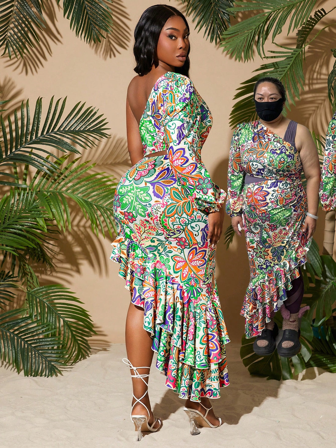 Get ready to turn heads with this chic plus size dress! Perfect for spring and summer, its asymmetric cutout and high slit add a touch of effortless style. Whether you're hitting the beach or going on a date, this dress will be sure to impress. Available in multiple sizes for all body types.