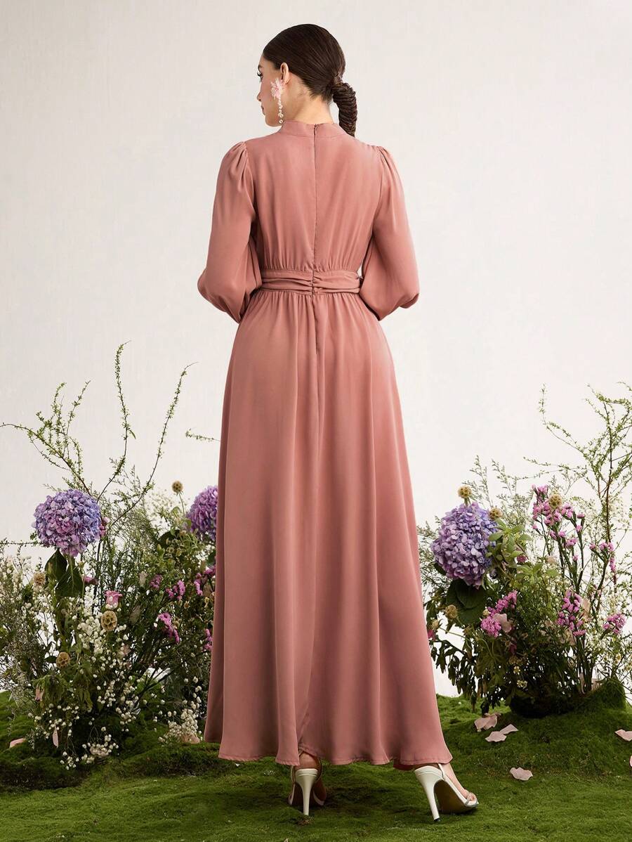 Step into effortless charm with this Elegant Floral Pleated Long Sleeve Dress. Its delicate floral print and flowing pleats bring a playful touch to your look, while the long sleeves add a hint of sophistication. Perfect for everything from brunch dates to garden parties, this dress lets you twirl through any occasion with grace and style.