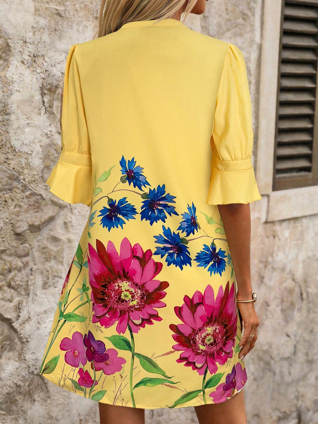 Say "hello" to summer in style with our Floral Print Puff Sleeve Cut-Out Neck Casual Dress! Perfect for all your summer vacations, this dress features a playful floral print and trendy puff sleeves. The cut-out neckline adds a touch of flair to this must-have summer dress.