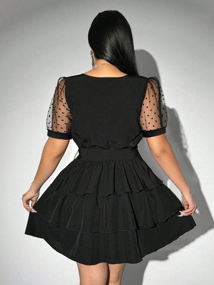 Step out in style with this Elegant Plus Size Polka Dot Patchwork Dress! Featuring charming puff sleeves and a flattering tie waist, it combines playful patterns with a comfortable fit. Perfect for adding a fun, feminine touch to your wardrobe while celebrating your curves with confidence.