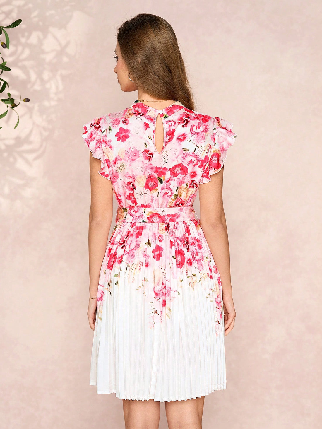 Introducing the ultimate summer party dress! Our Chic Pink Floral Midi Dress features a flattering tie waist and a vibrant floral print that will turn heads at any event. From tea parties to garden soirees, this dress is the perfect choice for any occasion. So go ahead and RSVP, because this dress will make you the belle of the ball!