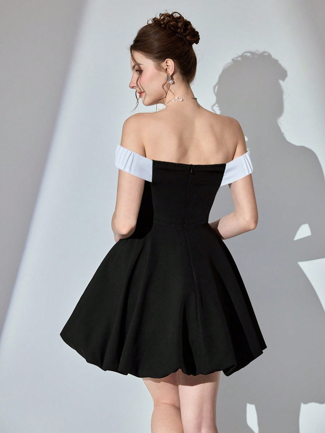 Elevate your wardrobe with this stunning cocktail dress that effortlessly transitions from brunch to evening soirée. Crafted with refined elegance, this piece features a flattering silhouette that works beautifully for weddings, parties, and those moments when you want to feel absolutely fabulous in everyday life. The versatile design pairs seamlessly with heels for a night out or flats for casual sophistication. Whether you're celebrating a special occasion or simply treating yourself to something special,