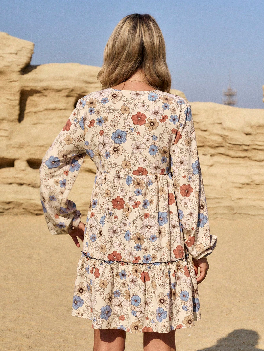 Get ready to turn heads in this Chic Floral V-Neck Ruffle Trim Long Sleeve Dress! With its playful and flirty ruffle trim and vibrant floral print, this dress is perfect for any casual vacation. Its lightweight fabric and long sleeves make it versatile for any weather. Say hello to your new go-to outfit!