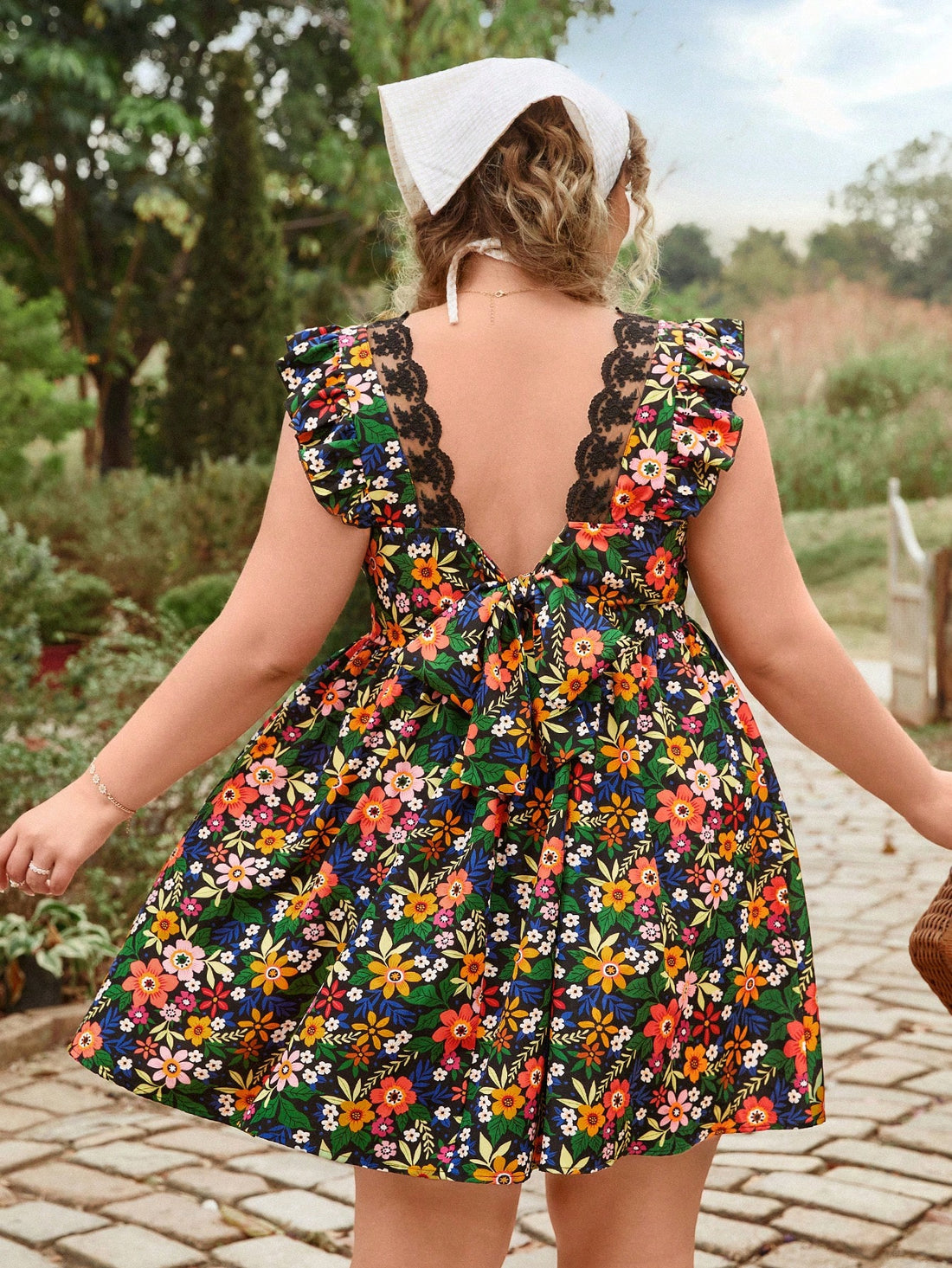 Embrace sunny days in this playful plus size V-neck dress, featuring a charming floral patchwork design and breezy cap sleeves. Perfect for beach strolls or holiday adventures, its lightweight fabric keeps you cool and comfortable while adding a splash of vibrant style to your wardrobe.