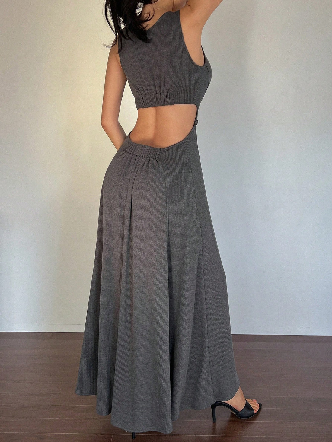 Effortless Elegance meets summer vibes with this sleeveless hollow V-neck dress. Stay cool and stylish with its airy design and classic silhouette. Perfect for any occasion, this dress effortlessly exudes elegance (pun intended).