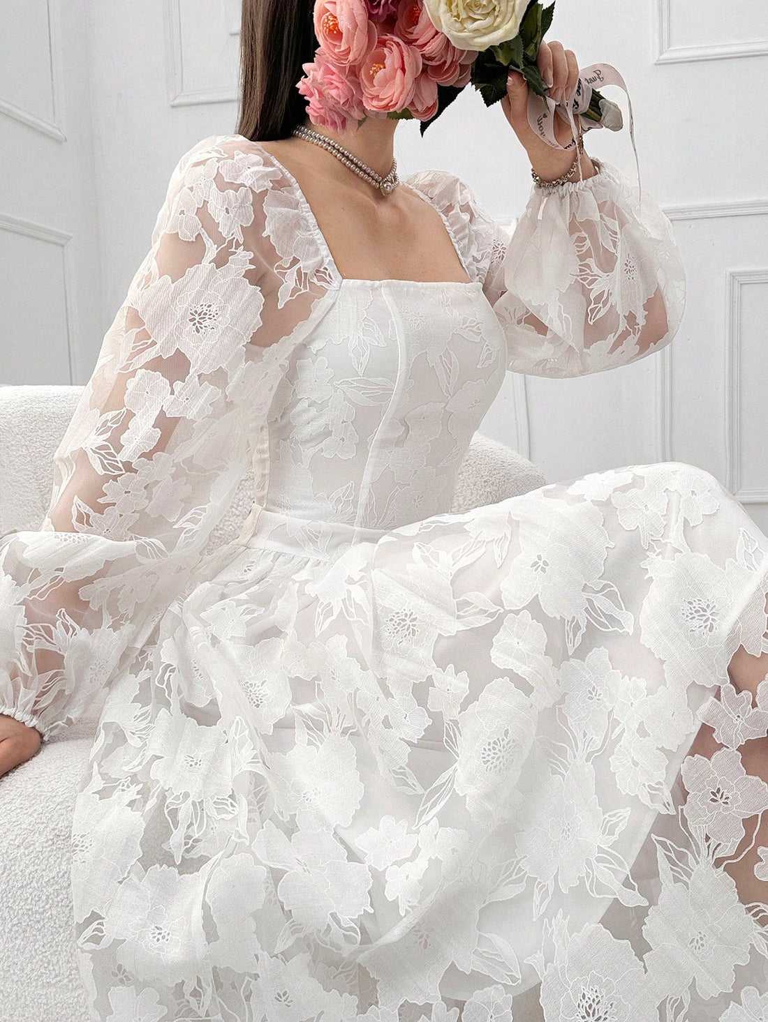 Step into style with this Elegant Floral Jacquard Dress, designed to turn heads wherever you go. Featuring a flattering square neckline and long sleeves, its mid-length cut strikes the perfect balance between chic and comfortable. The intricate floral jacquard pattern adds a touch of whimsy, making it ideal for any occasion where you want to feel effortlessly fabulous.