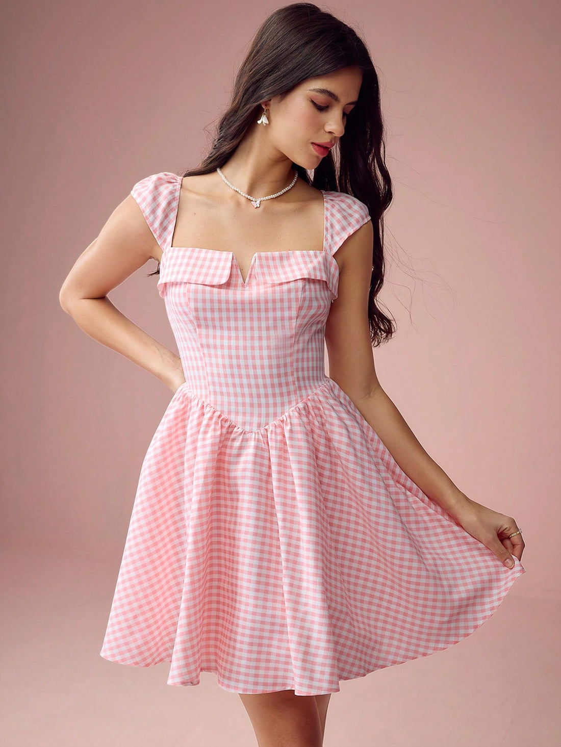 Get ready to turn heads in this Spring/Summer Mini Dress! With its elegant plaid design and sweet square collar, this dress offers effortless style without sacrificing comfort. Perfect for any occasion, this dress will make you feel stylish and chic while also being comfortable. Time to make a statement!