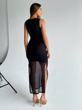 Rear three quarter view of black sleeveless bodycon dress with sheer mesh maxi overlay