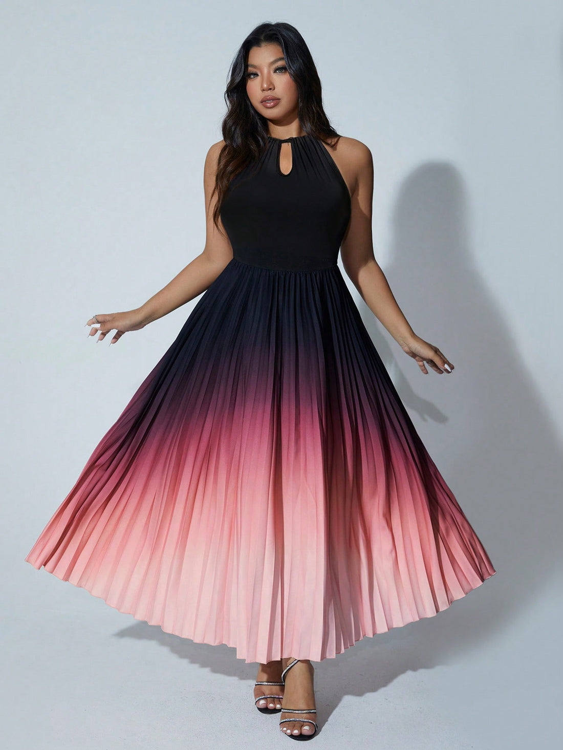 Turn heads with this Chic Plus Size Ombre Halter Neck Pleated Dress, perfect for making a stylish statement at any elegant event. The flattering halter neckline and flowing pleats create a graceful silhouette, while the ombre effect adds a fun splash of color that dances with every step. Celebrate your curves and embrace your playful side in this effortlessly stunning dress!