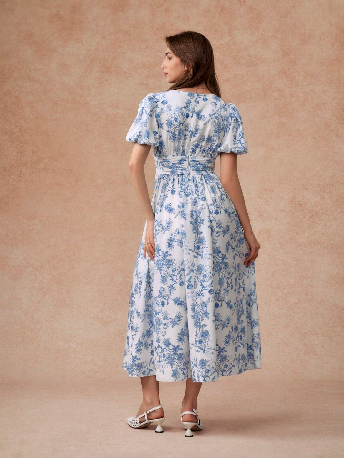 Be the epitome of spring and summer style with our Elegant Puff Sleeve V-Neck Waisted Dress. The perfect balance of sophistication and comfort, this dress features a flattering v-neck and puff sleeves, making it a must-have for any fashion-forward wardrobe. Embrace the season in style!