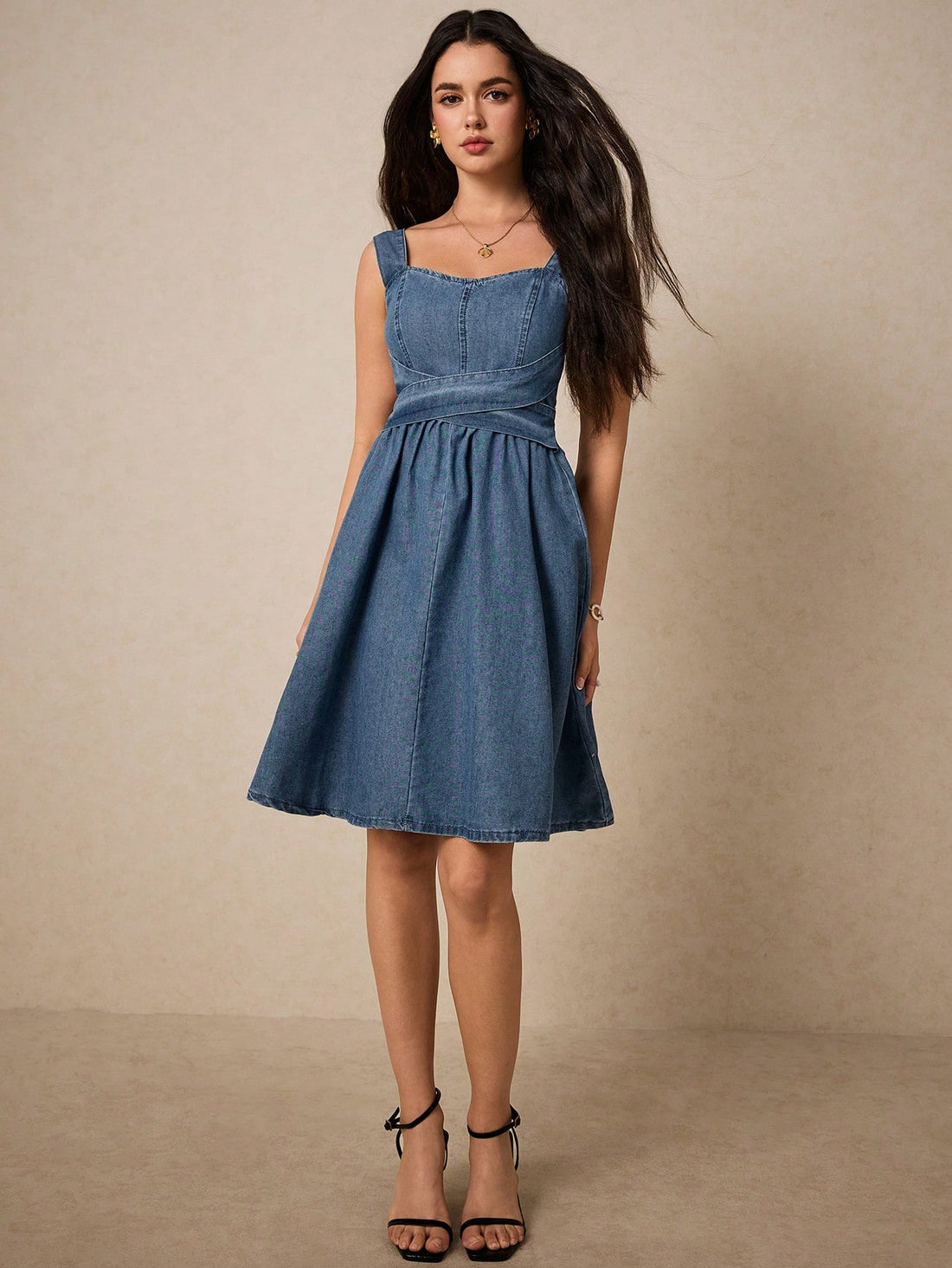 Effortlessly style yourself in this chic and casual denim suspender midi dress. Its A-line shape and midi length will flatter any figure, while the suspenders add a touch of playfulness. Perfect for a day out, this dress exudes effortless style.