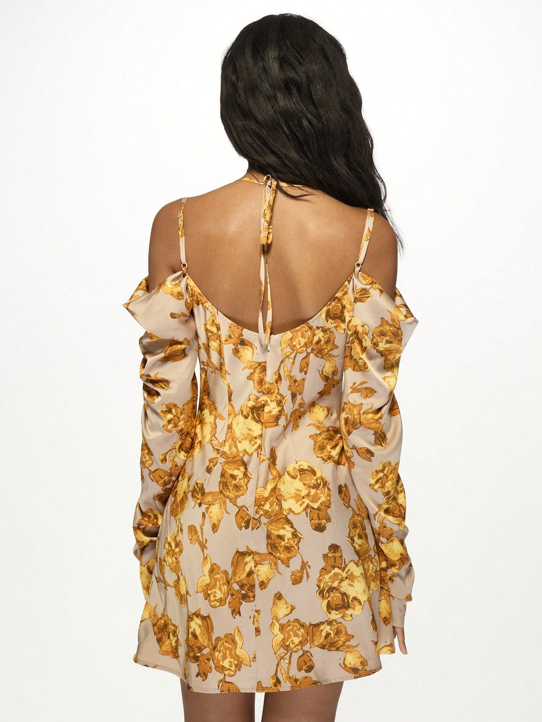 Unleash your effortless style with our Chic Printed Cowl Neck Mini Dress. The flattering cowl neck and drape sleeves add a touch of sophistication, while the playful print keeps things fun and stylish. Perfect for any occasion!