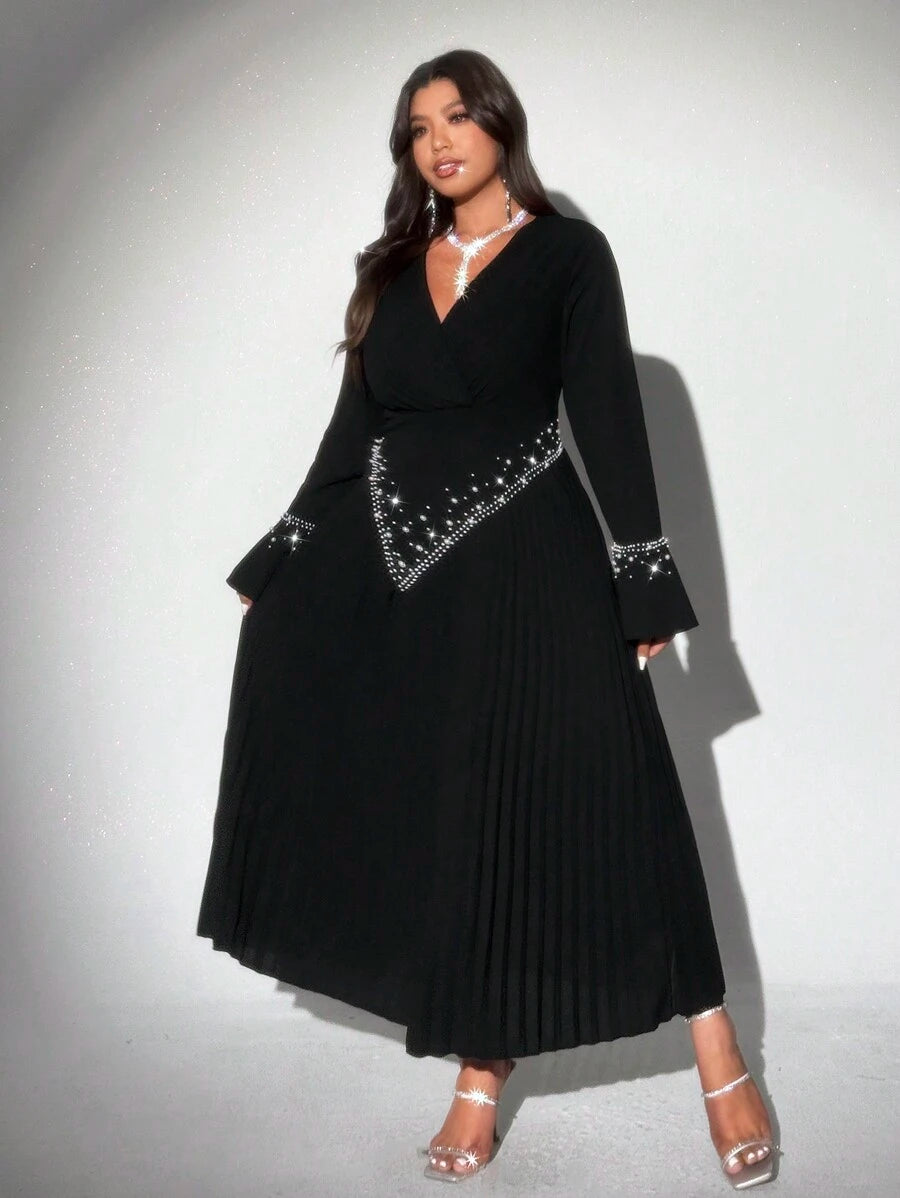 Step into the spotlight with this playful plus size dress, featuring delicate pearl accents and flowing pleats that dance with every move. Its long sleeves add a touch of elegance, making it perfect for romantic holiday parties where you want to shine and feel fabulous all night long.