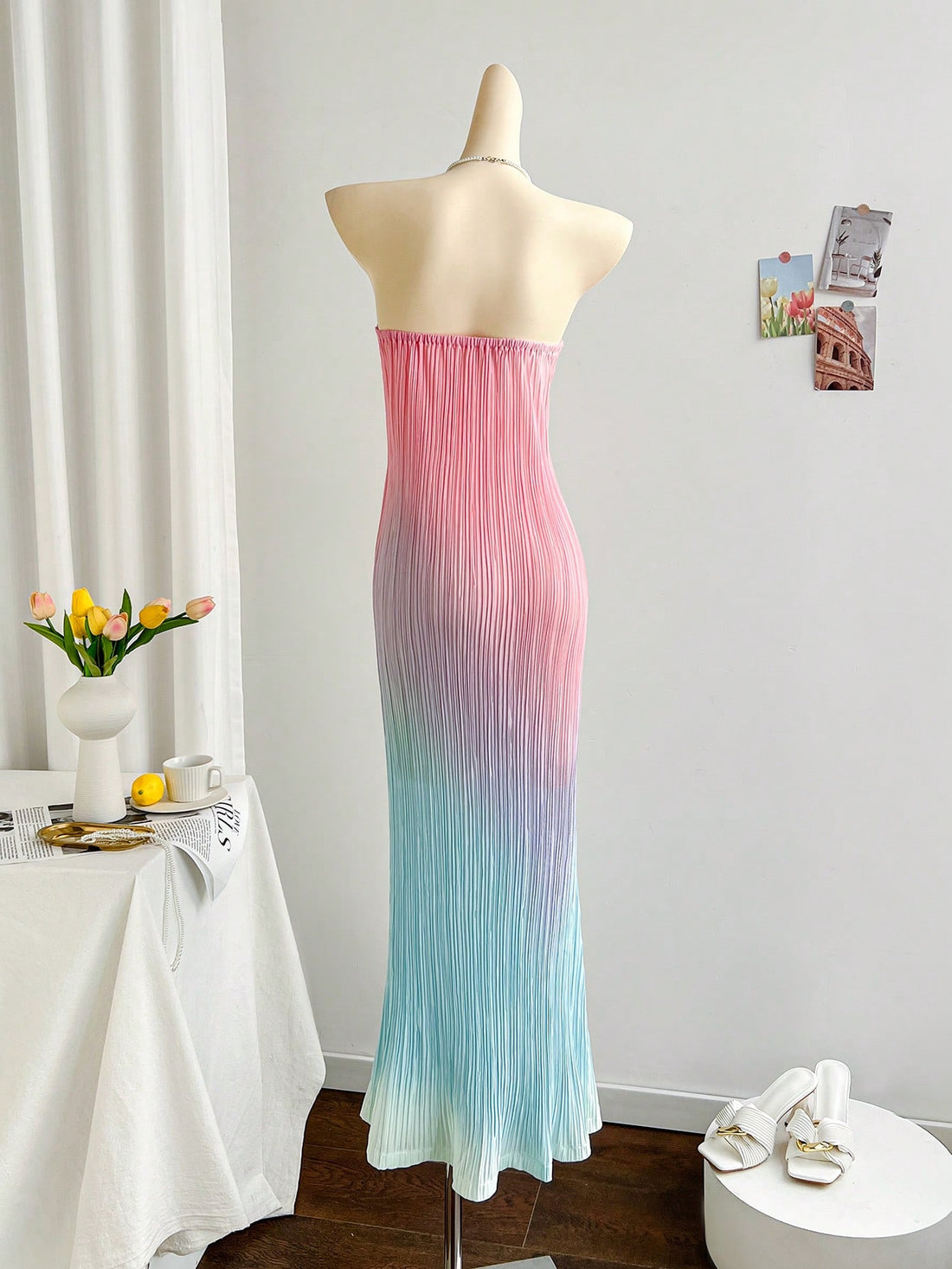 Get ready to be the most stylish and carefree festival-goer or vacationer in our Bohemian Ombre Pleated Twist Bandeau Dress! With a unique twist on the classic bandeau style, this dress features a playful ombre design and pleated details that will have you standing out from the crowd. Perfect for dancing, lounging, and taking fun pictures.