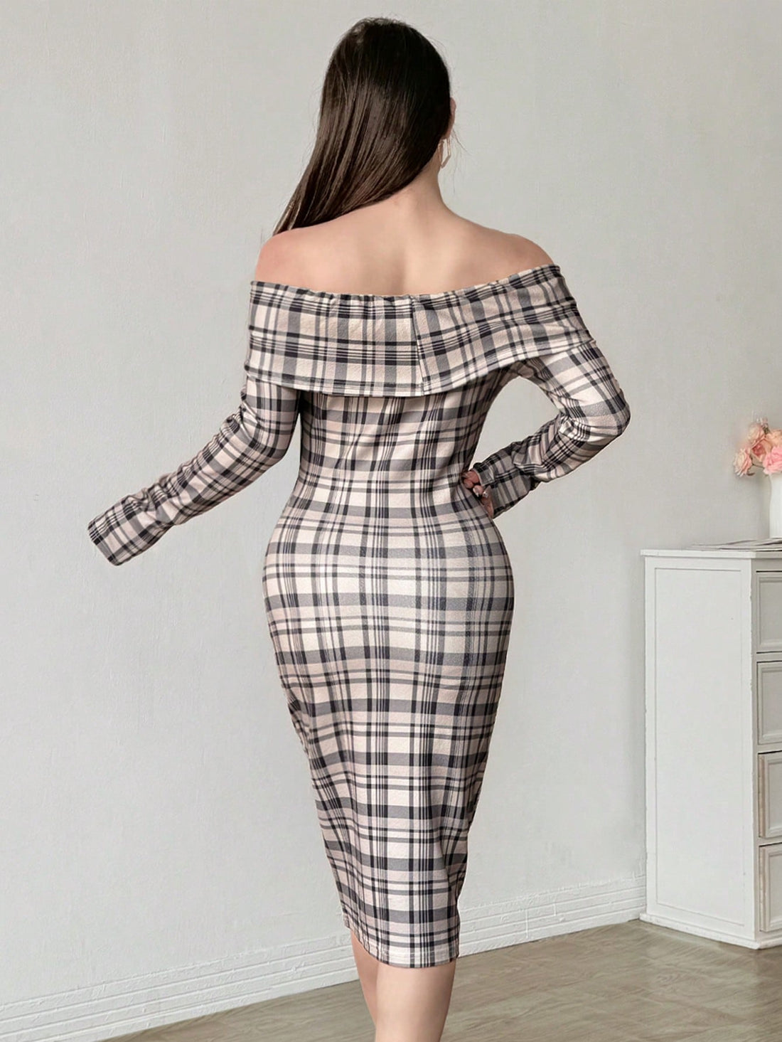 Unleash your bold and confident side with our Long Sleeve Fitted Off Shoulder Plaid Mini Dress! The statement sleeves add a playful touch to this daringly unique dress. Perfect for standing out in a sea of basic outfits, this dress will have you feeling fierce and fashionable.