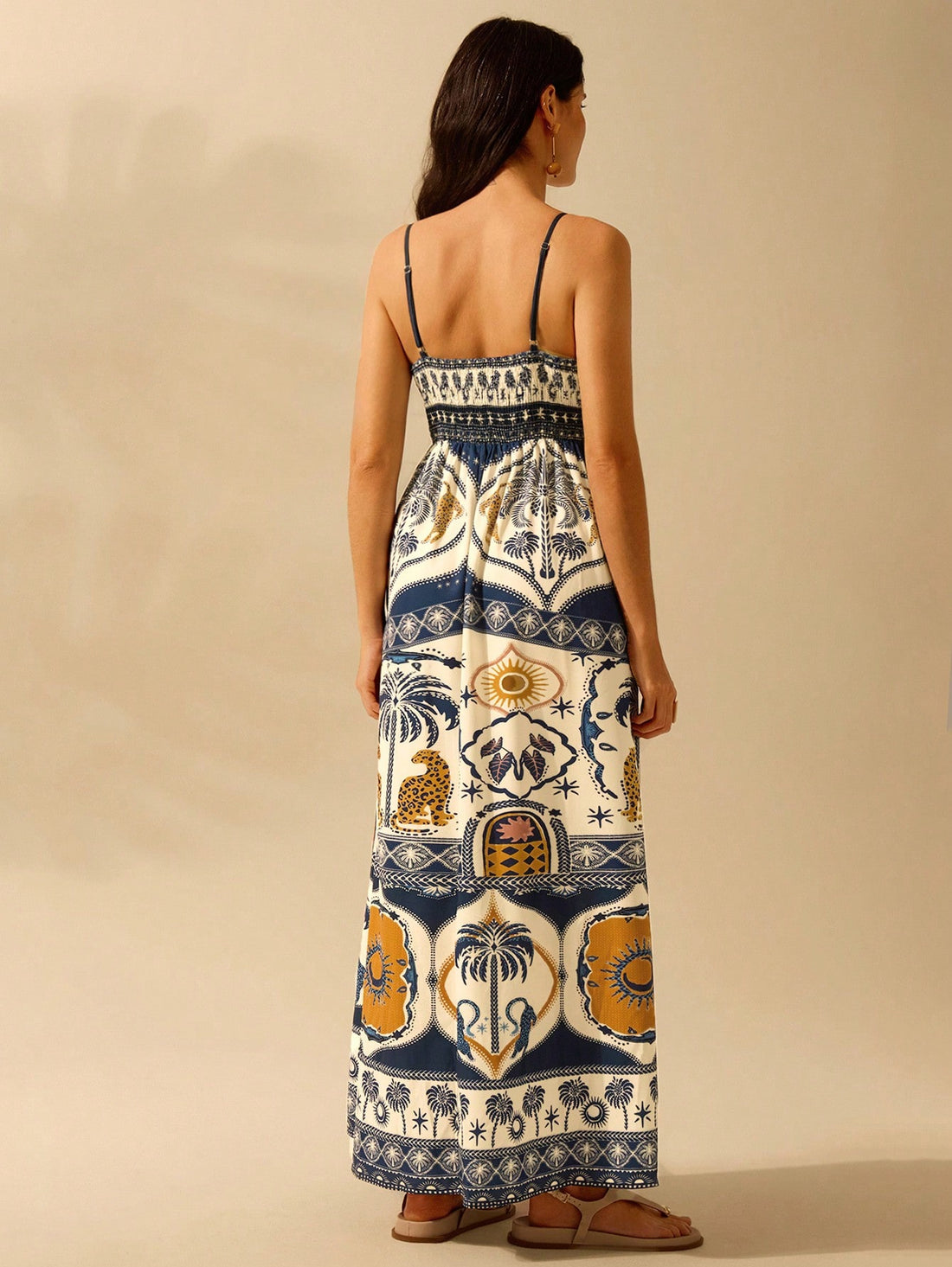 Unleash your wild side with our Boho Chic Tropical V-Neck Dress. Featuring a bold leopard and palm leaf print, this dress is perfect for your summer getaways. With its relaxed fit and stylish v-neck, you'll be turning heads wherever you go. Get ready to be the queen of the jungle!