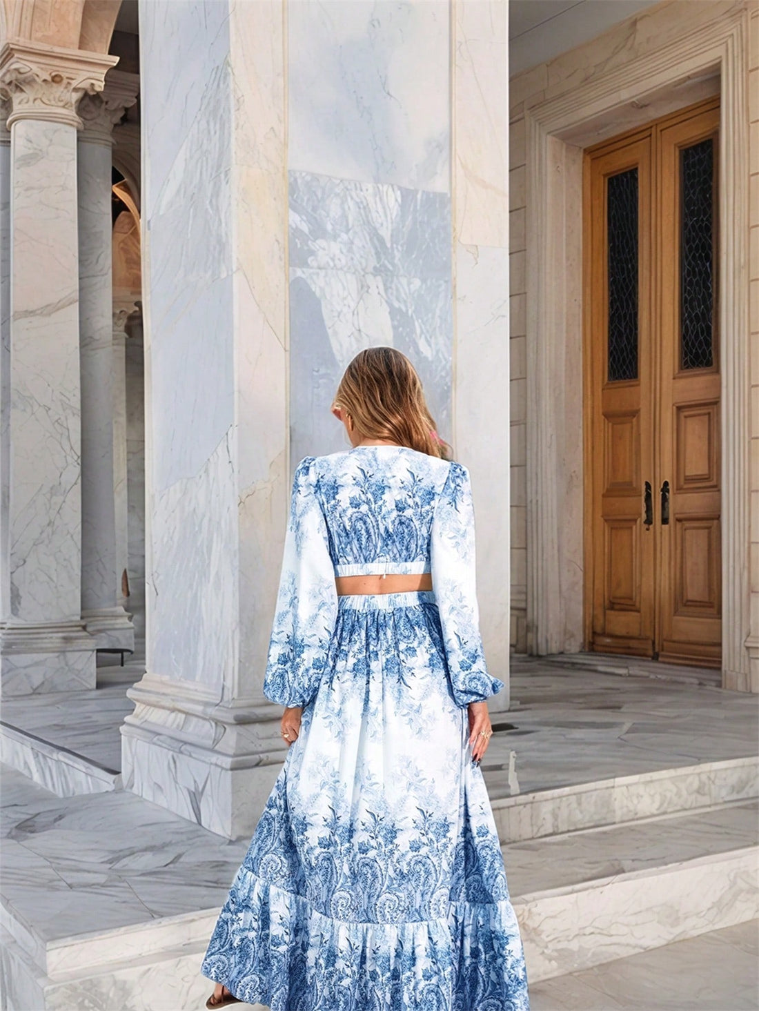 Twirl into summer adventures with our V-Neck Hollow-Out Dress! This flirty number features delicate cutouts that catch the breeze while long sleeves offer just-right coverage for evening strolls. Perfect for dancing at festivals or candlelit dinners on vacation, it's the dress that says "fun" but whispers "elegant." Pack light, stand out!