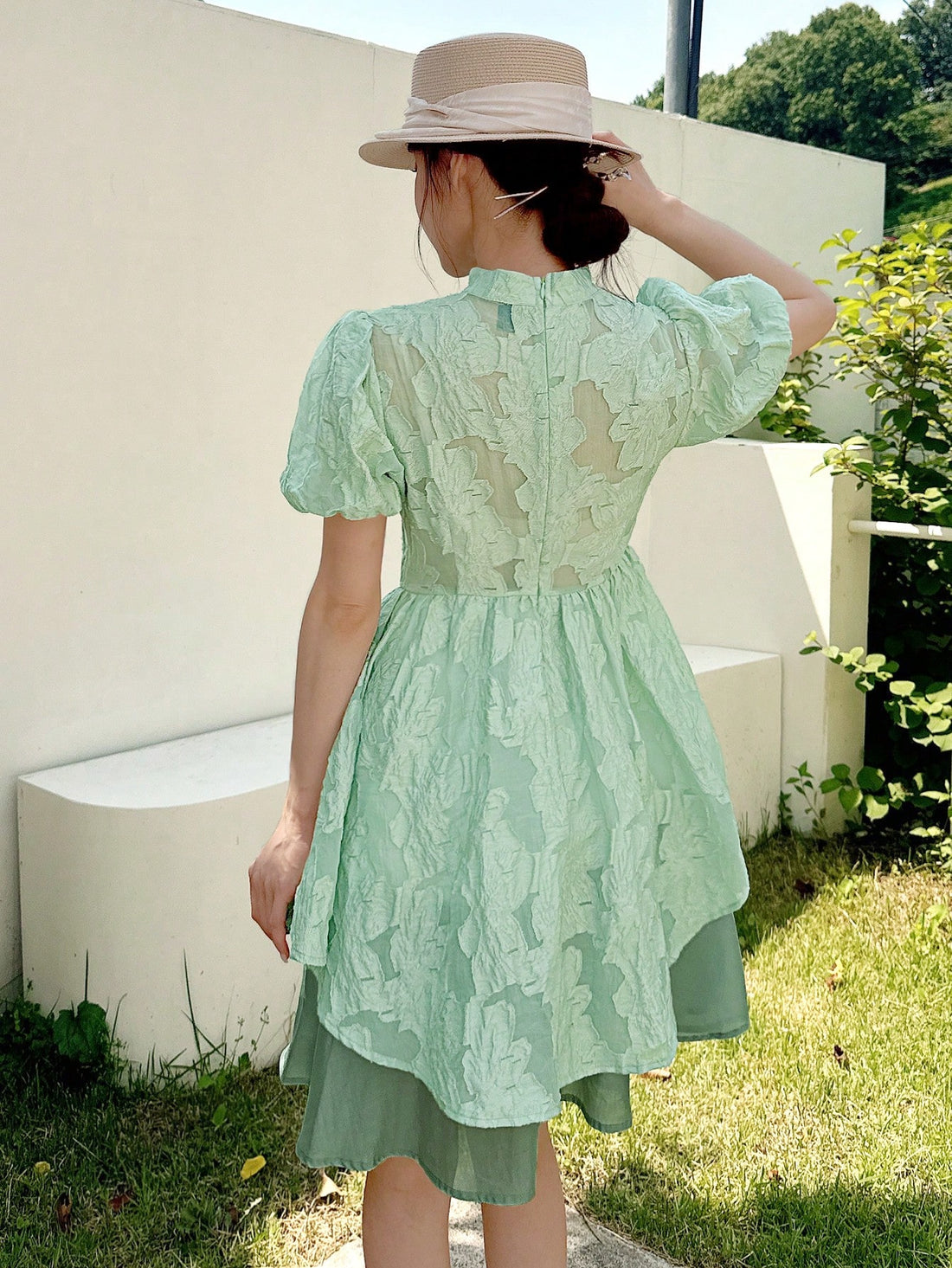 Embrace timeless charm with this elegant Chinese-style dress featuring a stand collar and playful bow detail. Its flared skirt effortlessly creates a slimming silhouette, perfect for twirling through your day with grace and fun. Add a touch of cultural flair and flattering style to your wardrobe!