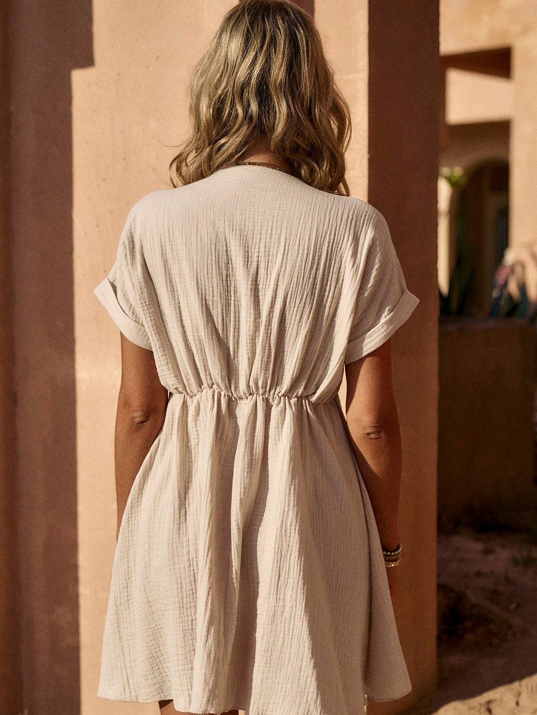 Introducing the perfect blend of effortless elegance and playful vacation vibes with our V-Neck Ruffle Trim Dress. This must-have piece for Spring/Summer will have you feeling fabulous and carefree. With its flattering silhouette and trendy ruffle accents, this dress is the perfect choice for any casual occasion. (Effortless style, playful vacation vibes, flattering silhouette, trendy ruffle accents.)