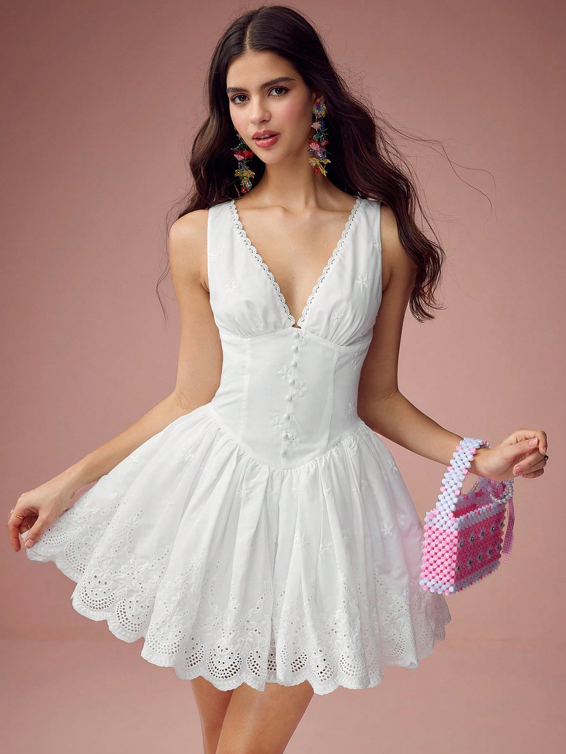 Twirl into spring and summer with this absolutely gorgeous floral eyelet mini dress! Delicate cut-out details add a touch of modern flair to the timeless charm of blooming florals, making it the perfect pick for garden parties, brunches, and warm-weather celebrations. The lightweight, breathable fabric keeps you cool and comfortable while the flattering silhouette ensures you'll feel confident and radiant. Whether you're dancing under the stars or sipping cocktails with friends, this elegant sundress is you
