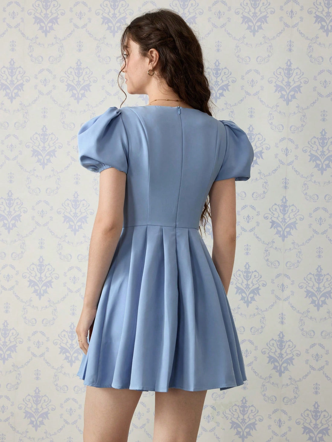 Be the belle of the ball in our Effortlessly Elegant Dress! Featuring a flattering v-neck and playful puff sleeves, this dress is perfect for any occasion. The charming bow detail adds a touch of whimsy to the lovely light blue color. You'll feel effortlessly elegant in this dress!
